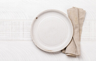 Empty plate with napkin