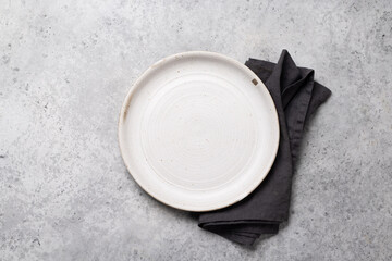 Empty plate and towel