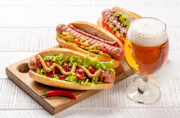 Various hot dog and beer