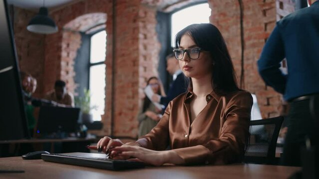 Smart Woman In Office, Portrait Of Lady With Computer Against Multiethnic Employees Of Company