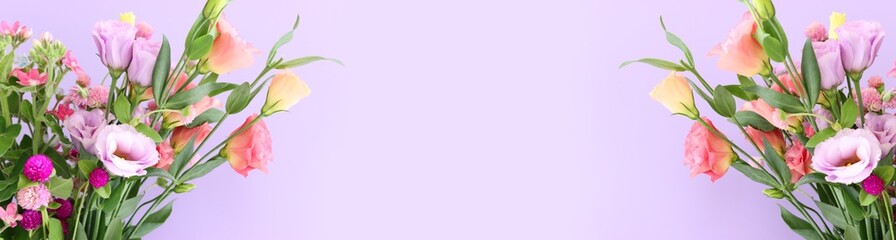 Top view image of pink and purple flowers composition over pastel background