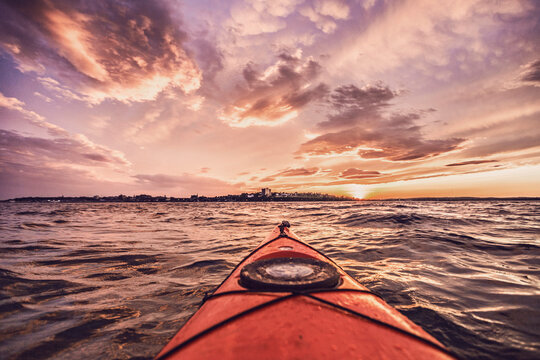 Portland seen at sunset from kayak in Casco Bay, Maine, USA