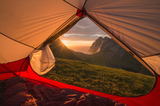 Sunset over Bunes beach from inside tent