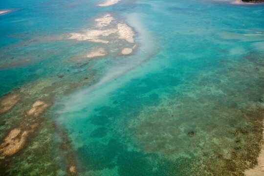 an aerial view of the florida keys blue green water