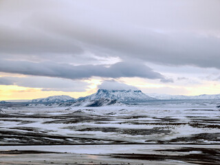 A crater and snowy apocalyptic landscape near Krafla power plant and volcano