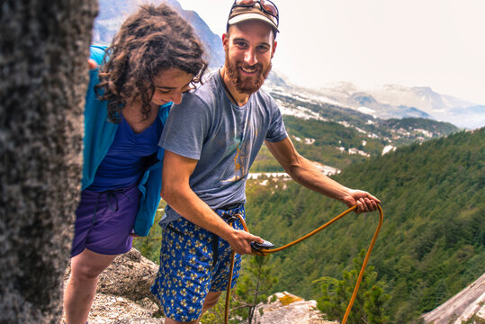Two smiling rock climbers, Squamish, British Columbia, Canada