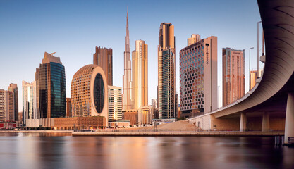 Panoramic view of Dubai Creek and sunrise city skyline, United Arab Emirates, night Dubai ultra modern skyline