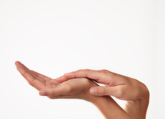 Beauty from fingertip to fingertip. Closeup studio shot of a womans hands.