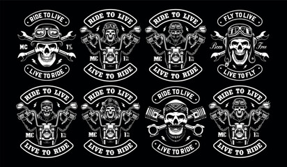 Bundle of vintage motorcycle badges with skull biker on a dark background