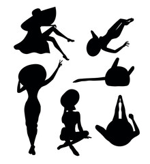 Vector set of different black silhouettes of girls for design