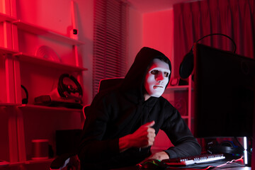 This is the face of a hacker who is knowledgeable with operating systems and other programs. He will exploit flaws and breach the computer system to cause damage.