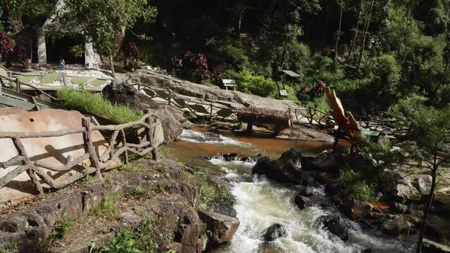 Wooden Bridges Over Fast Flowing River In Datanla Falls In Dalat, Vietnam. Slow Motion