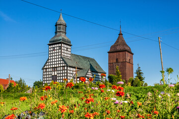 Half-timbered Church of St. Trinity in Wielki Buczek, Greater Poland Voivodeship, Poland - obrazy, fototapety, plakaty