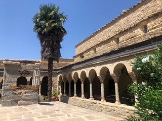 claustro de monasterio. , iglesia y pueblo y entorno de Graus. 
Pirineo aragones. texturas y...