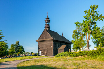Fototapeta na wymiar The wooden church of St. Isaac in Kazimierz Biskupi, Greater Poland Voivodeship, Poland