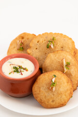 Traditional Indian Malpua, Pua Or Pooa Served With Lachhedar Malai Rabri Also Called Khurchan Rabdi, Lachha Rabidi Is Widely Enjoyed On Festival Like Holi, Diwali