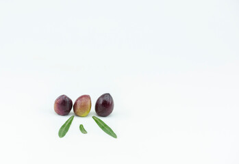white background
leafy green olives