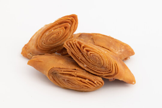 Indian Madatha Thumb Khaja Also Called Gottam Kaja, Badusha, Chirote, Kakinada Kaaja Is Traditional Layered Sweet Puff Pastry Famous In Andhra, Bengal, Gujrat, Bihar, Agra, Odisha, Orrisa In India