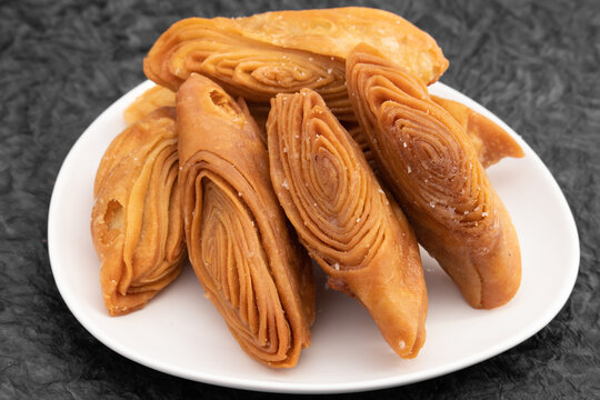 Indian Madatha Thumb Khaja Also Called Gottam Kaja, Badusha, Chirote, Kakinada Kaaja Is Traditional Layered Sweet Puff Pastry Famous In Andhra, Bengal, Gujrat, Bihar, Agra, Odisha, Orrisa In India