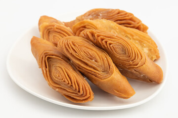 Indian Madatha Thumb Khaja Also Called Gottam Kaja, Badusha, Chirote, Kakinada Kaaja Is Traditional Layered Sweet Puff Pastry Famous In Andhra, Bengal, Gujrat, Bihar, Agra, Odisha, Orrisa In India