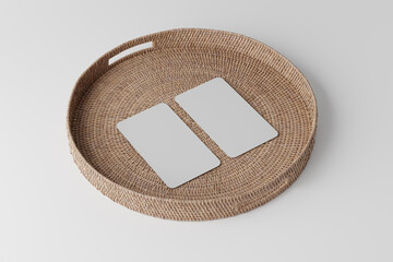 business cards on a rattan tray