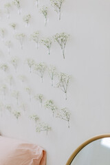Flower pattern on the white wall