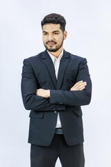 Portrait isolated studio shot  Asian Indian professional successful bearded male businessman entrepreneur ceo manager in formal business suit stand smiling crossed arms posing on white background