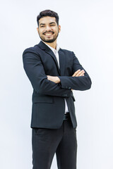 Obraz na płótnie Canvas Portrait isolated studio shot Asian Indian professional successful bearded male businessman entrepreneur ceo manager in formal business suit stand smiling crossed arms posing on white background