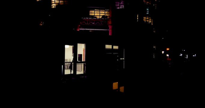 Dublin city windows at night in a round building mostly rented accommodation
