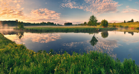 Fototapeta na wymiar Beautiful spring sunrise over river bank. nature of Ukraine