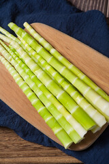 Peeled green bamboo shoots  on table