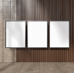 Vertical posters on beige and dark wooden wall