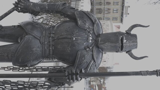 Russia Vyborg 02.02.2023 Sculpture of a medieval knight in armor in the park