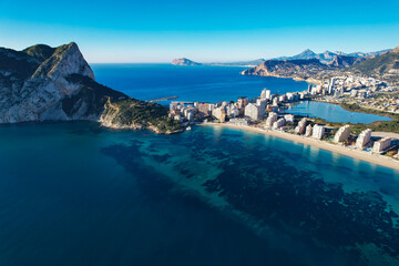 Aerial panoramic view of the beautiful city of Calp in Spain with Peñón de Ifach Parc Natural