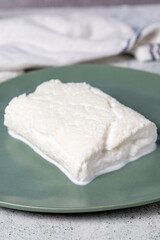 Clotted cream or butter cream. Turkish creamy dairy product. Cow's cream for breakfast. Local name kaymak. Close up