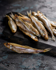 Salted dried capelin fish. Fish appetizer for beer