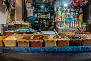 Typical and regional food and spices from a shop in a souk in Marrakesh 