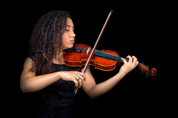 Beautiful Afro violinist girl playing the violin