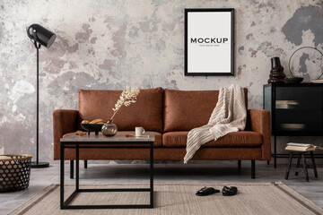 Loft industrial apartment with mock up poster, brown sofa, black stripes commode, coffee table, grey rug and lamp.