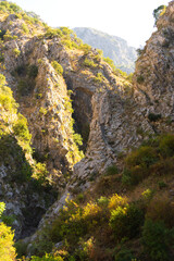 Gorge in the rocky mountains on a bright sunny day. Hiking in the mountains. Montenegro. Selective focus.
