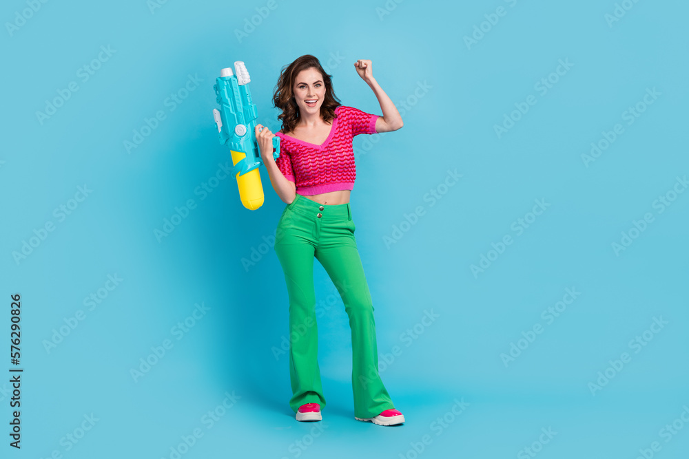 Sticker Full length photo of overjoyed funky lady wear trendy clothes celebrate win play game empty space isolated on blue color background