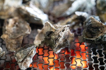 Grilled fresh oyster in Taiwan, famous street food.