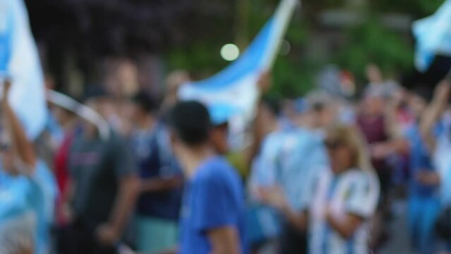 Argentina fans marching on the streets celebrating National Football Team victory in the World Cup.