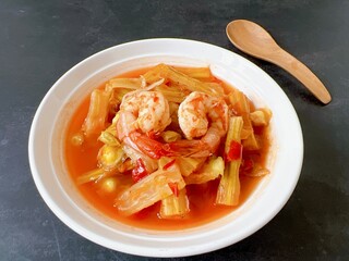 Top view Thai Moringa curry with shrimp, hot and sour flavour. (Kaeng som marum)