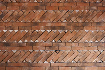 Obraz na płótnie Canvas damaged vintage block surface. Red brick wall texture for background. Brick surface for Interior and exterior material.