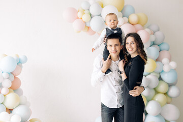 Fototapeta premium Happy family celebrates first birthday of baby boy.