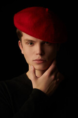 young man in red beret