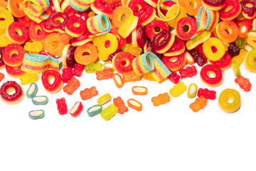 Assorted colorful gummy candies. Top view. Jelly donuts. Jelly bears. Isolated on a white...