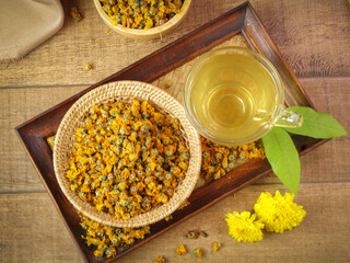 Chrysanthemum tea and Chrysanthemum flower. Healthy beverage for drink. Herbs and medical concept.
