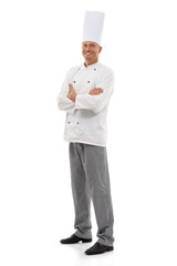 Master chef. Full length studio shot of a smiling chef isolated on white.